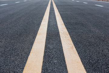 Obraz premium asphalt road with lines on the road