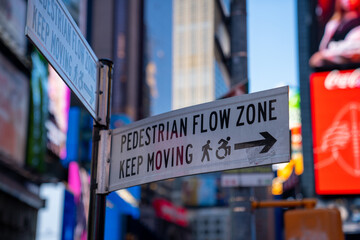 NYC pedestrian street signs in Times Square.