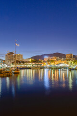 Hobart waterfront at night with Mount Wellington in background