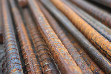 Close up deformed steel rusty background. Rusty steel bar in the construction site.