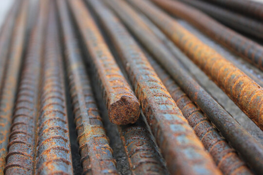 Close up deformed steel rusty background. Rusty steel bar in the construction site.