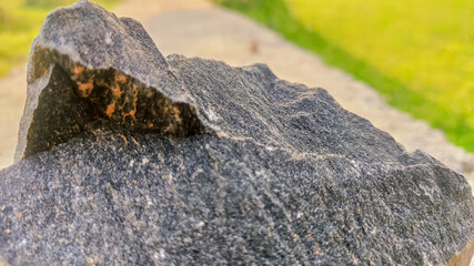 selective focus on a stone having rough surface