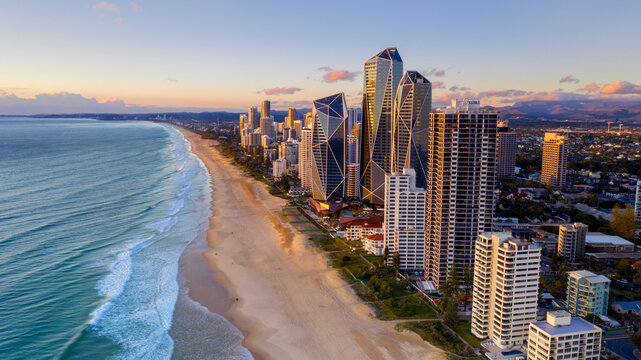 Sunrise views over Gold Coast beach with Surfers Paradise cityscape - Powered by Adobe