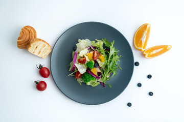 A plate of healthy and delicious salad and a bread