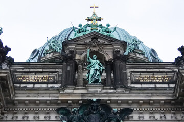 Fototapeta na wymiar Church dome with sculptures, Berlin