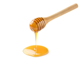 Pure Honey dripping from honey dipper isolated on a white background. clipping path.