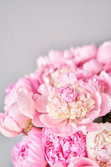 Obraz na płótnie Canvas Pink Angel Cheeks peonies in a metal vase. Beautiful peony flower for catalog or online store. Floral shop concept . Beautiful fresh cut bouquet. Flowers delivery