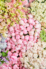 Floral carpet or Wallpaper. Background of mix of flowers. Beautiful flowers for catalog or online store. Floral shop and delivery concept. Top view. Copy space