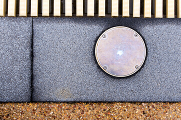 The surface texture on the joint of the different non slip flooring and the metal cover of service...