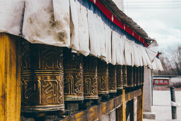 Obraz na płótnie Canvas The prayer wheels in a Tibet Temple, China