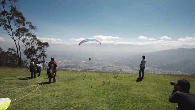 Ready to fly At Summit. Paraglider Take-Off. Paraglider preparing to launch in air.