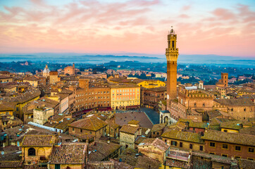Fototapeta na wymiar Siena cityscape at sunset.
