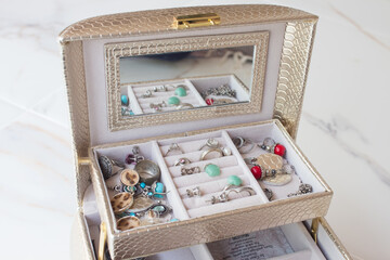  luxurious casket with drawers and silver jewelry, precious stones, pearls.
