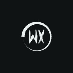 alphabet WX letter logo grunge brush logo icon design template
