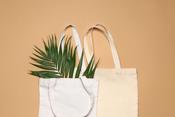 Eco bags on color background