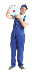 Delivery man with bottle of water on white background