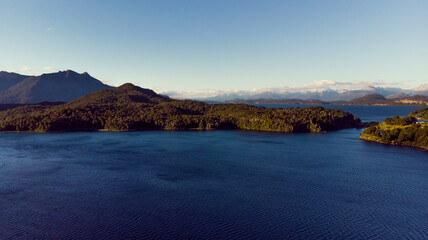 Sunset on lakes of argentinian patagonia bariloche from drone