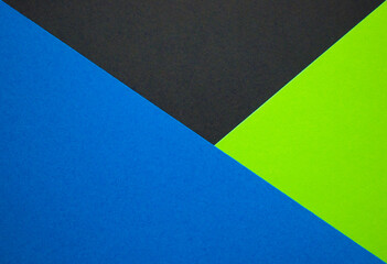 Blue, black and green background divided diagonally