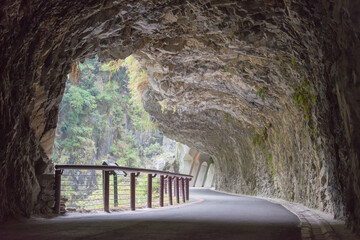 Jiuqudong (Tunnel of Nine Turns) at Taroko National Park. a famous tourist spot in Xiulin, Hualien,...