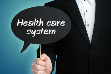 Health care system. Lawyer (Man) holds the sign of a speech bubble in his hand. Text on the label. Symbol of law, justice, judgement