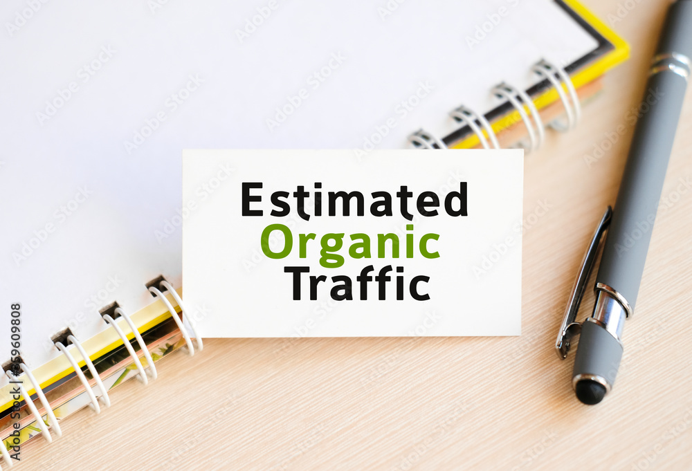 Aufkleber organic traffic - text on a notebook with a spring and a gray handle
