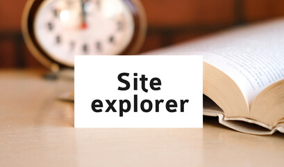Web site explorer - seo business concept text on a white book and clock