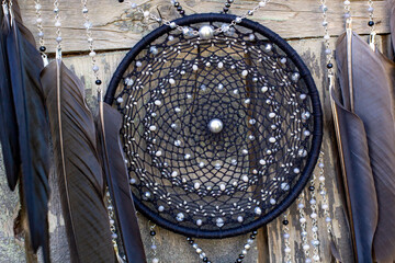 Handmade dream catcher with feathers threads and beads rope hanging