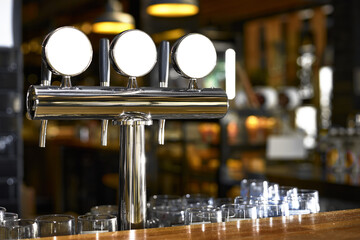 Beer tap in bar, mock up with selective focus. - Powered by Adobe
