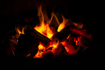 Fototapeta premium Empty Charcoal grill with open fire light at night