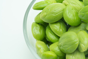 Bettter beans in glass bowl on white background