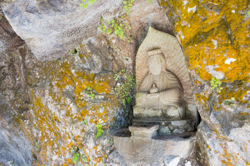 Fototapeta na wymiar Buddha Statue at Zhuilu Cliff in Taroko National Park, Xiulin, Hualien, Taiwan.