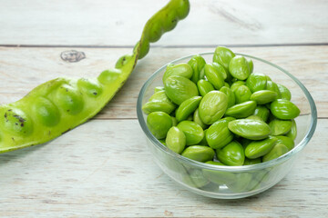 Bettter beans in glass bowl on wood table