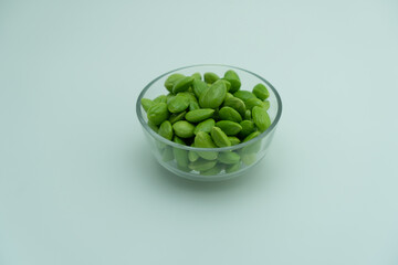 Bettter beans in glass bowl on white background