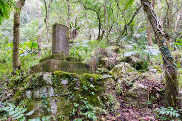 Monument of policeman who died on duty at Cliff Outpost ruins at Zhuilu Old Road in Taroko National...