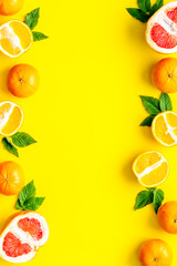 Frame of oranges and frapefruit top view