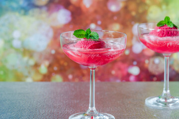 Festive vodka and prosecco cocktail with strawberry sorbet