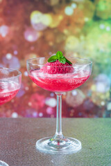 Festive vodka and prosecco cocktail with strawberry sorbet