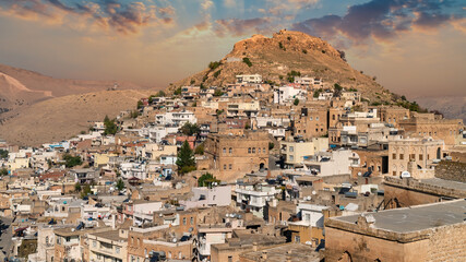 Town of Savur with old stone houses on a hill, Mardin, Turkey.