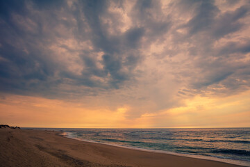 Obraz na płótnie Canvas Seascape, sunset over the sea. Atlantic ocean in the evening. Beautiful nature