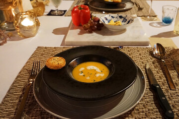 Close up bowl of pumpkin soup