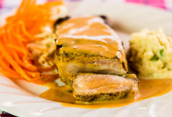 Fried pork steak in plate  , in door  Chiangmai  Thailand