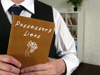 Conceptual photo about Possessory Liens with handwritten text.