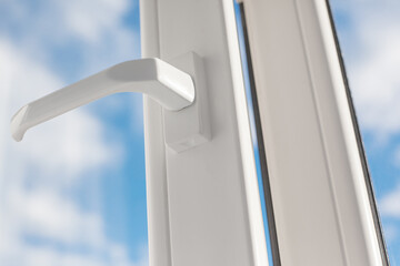 Open window handle. PVC plastic.