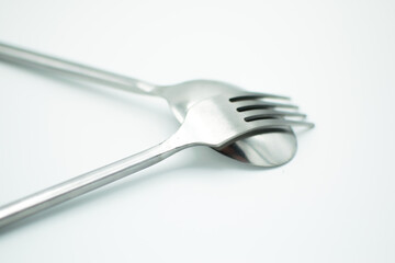 isolated stainless fork and spoon