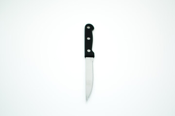 knife with black handle in a white background