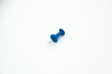 isolated blue pushpin in a white background