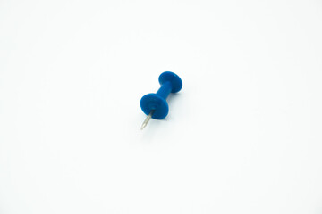 isolated blue pushpin in a white background