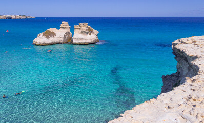 The most beautiful coast of Apulia: Torre Dell'Orso Bay, ITALY (Lecce).Typical seascape of Salento: view of the two stacks called The Two Sisters.
