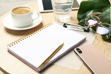 Composition with business accessories on wooden table. Blogger workspace
