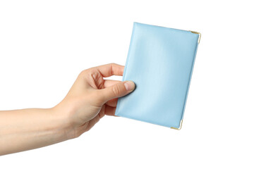Female hand holds passport cover, isolated on white background